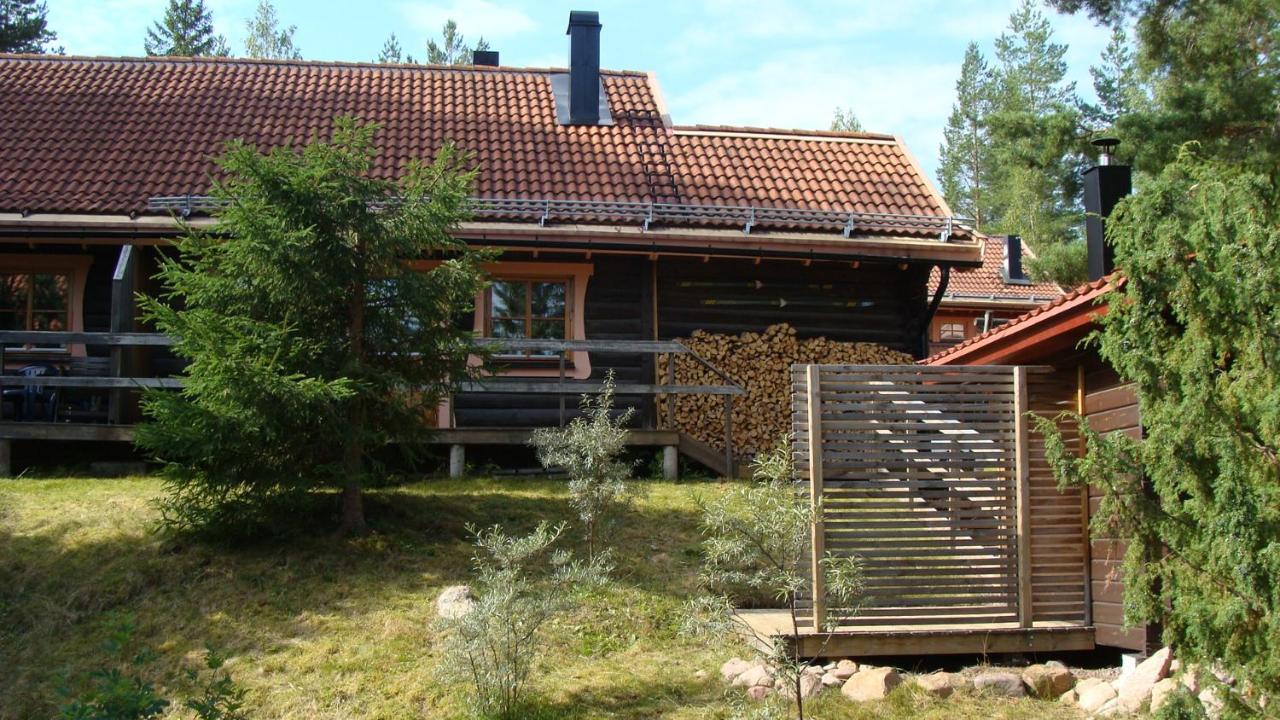 Tomtelandstugan Mora Esterno foto