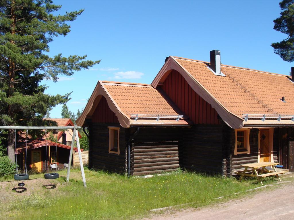 Tomtelandstugan Mora Esterno foto